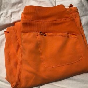 Never Worn orange scrub bottoms
